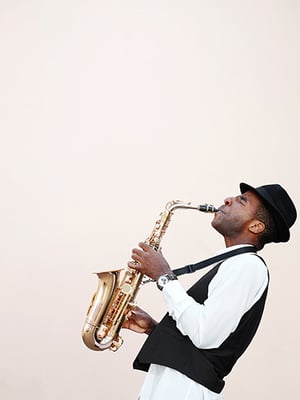 Neck strap saxophone player