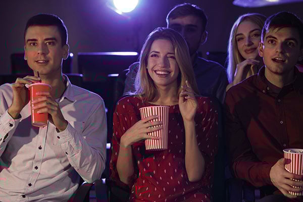 Movie fans in theatre.