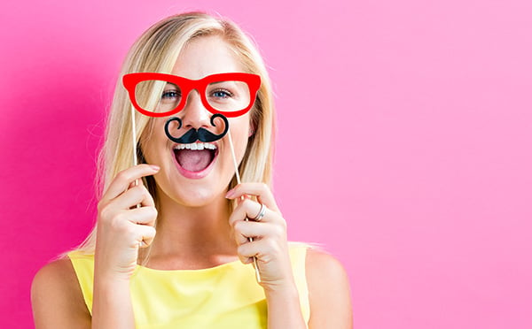 Smiling woman: Insurance for Photos Booths, Canada