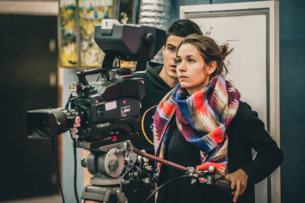 Female intern on film set: Interns and film